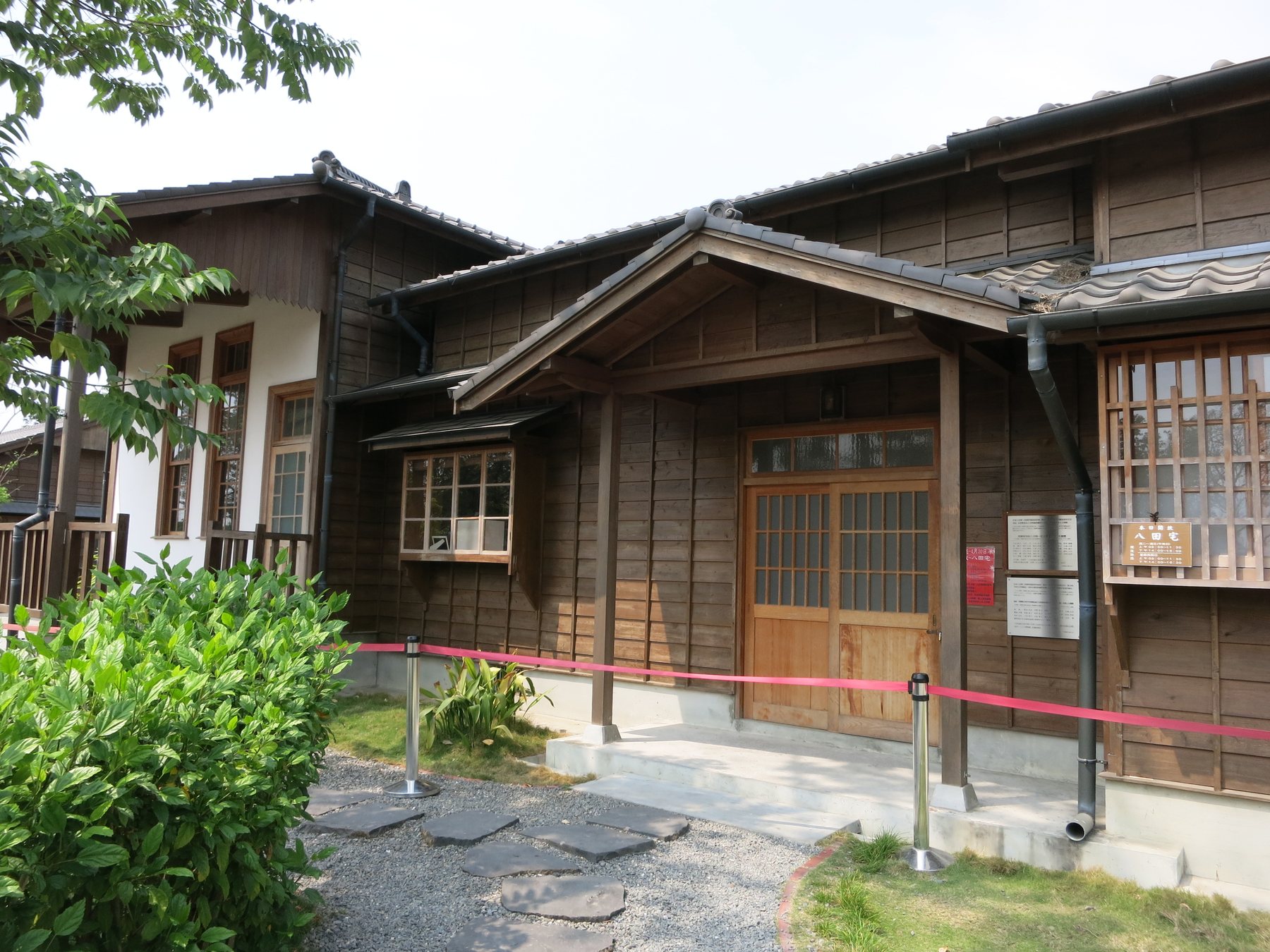 The timber exterior and entrance of the restored Hatta residence