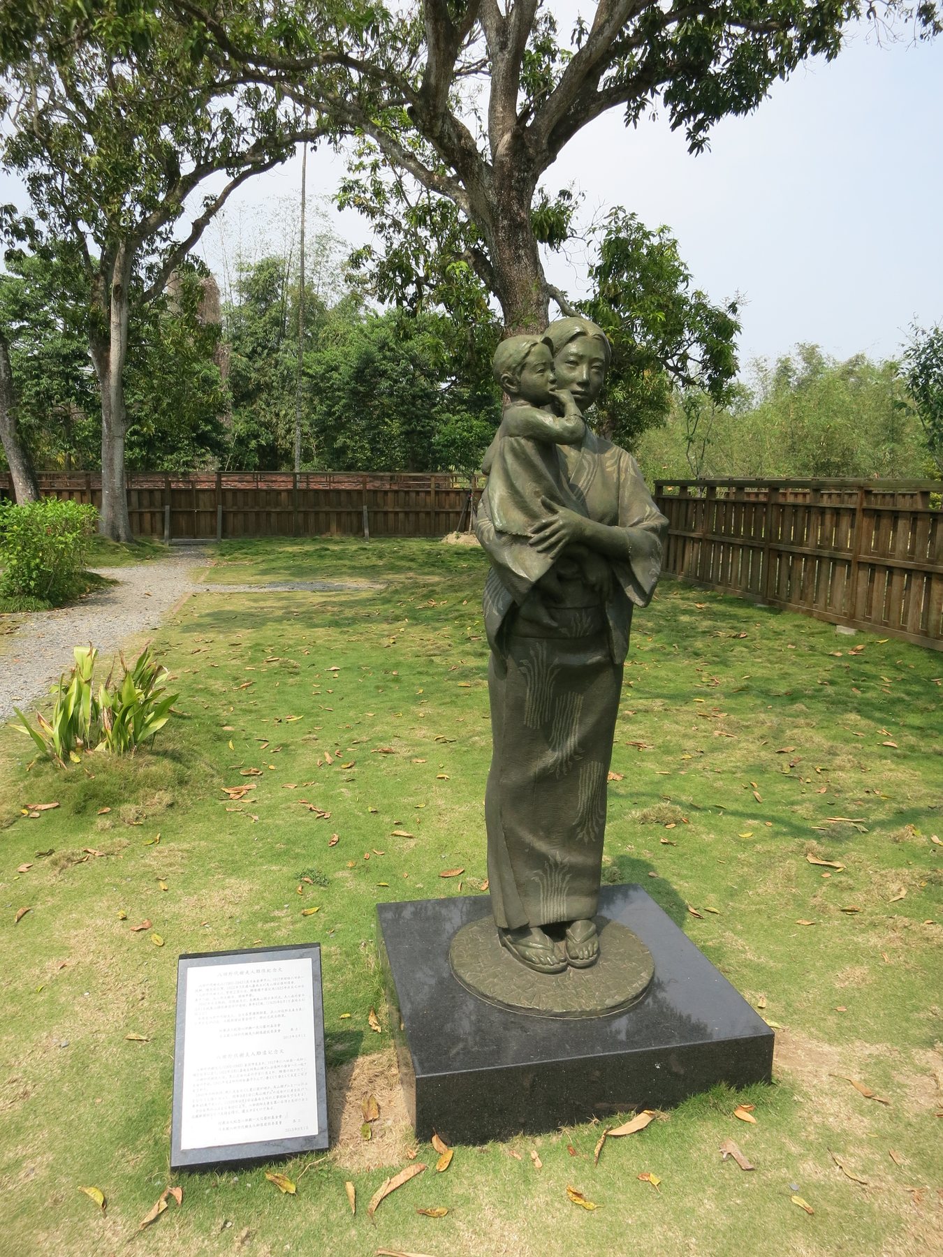 A statue of Yoichi Hatta’s wife holding a child in the memorial park