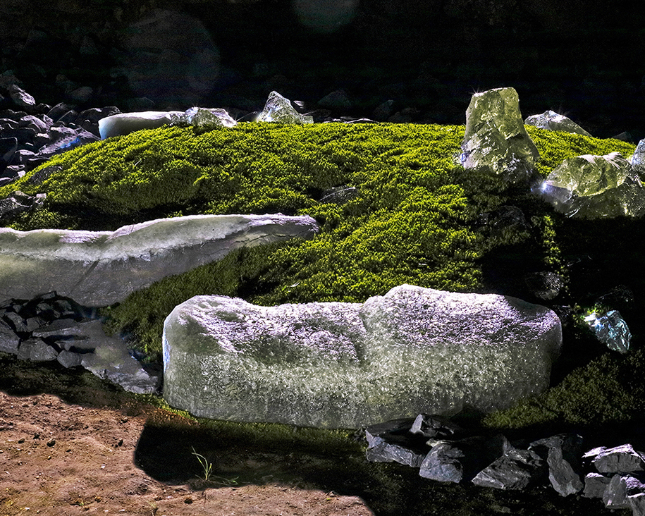 Close view of the glass karesansui on the moss at Honen-in, where transparent glass takes on qualities of ice and stone in sunlight